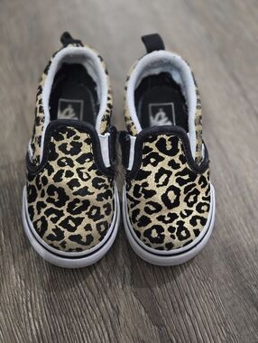 Vans Kids Slip-On Sneakers in Gold and Black Leopard Print